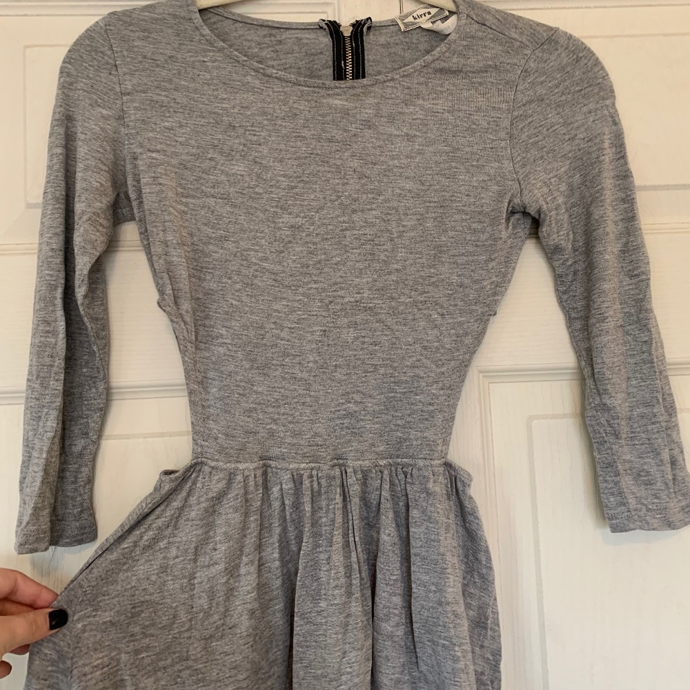 Peplum Shirt with Cut Outs